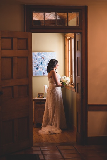 Bride Standing near the Window - Wedding Photography Guelph by Devon Crowell