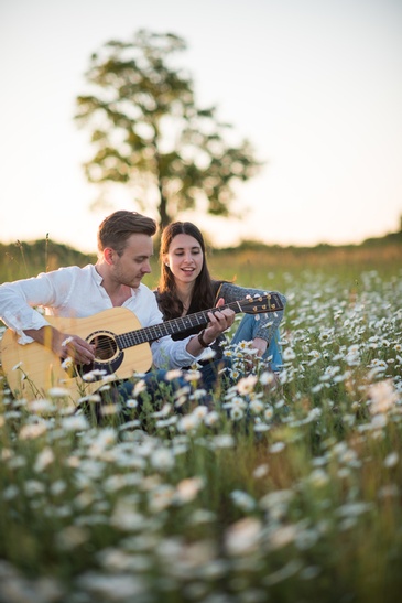 Couple Sitting in a Garden - Engagement Photography St. Jacobs by Devon C Photography