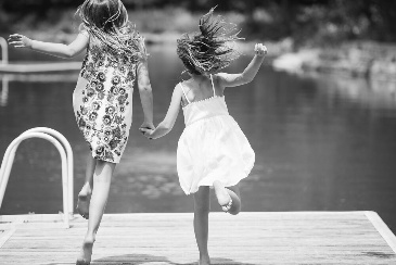 Siblings Running on Deck - Family Photography Guelph by Devon Crowell