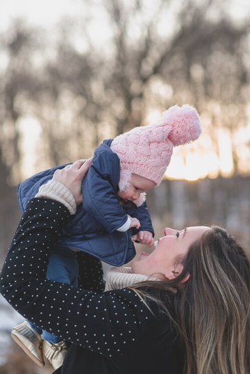 Mother Holding her Baby - Family Portrait Photography Barrie by Devon Crowell