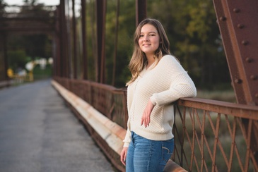 Girl Posing on a Bridge - Family Portrait Photography London ON by Devon Crowell