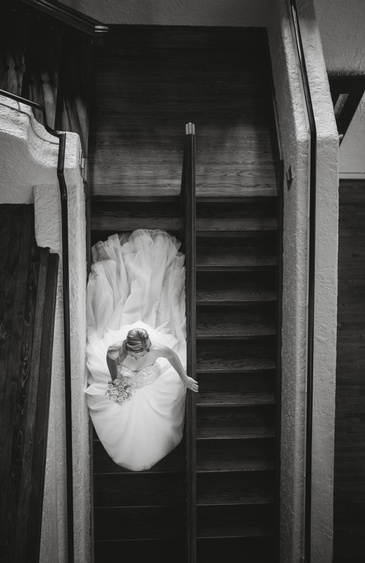 Bride Walking Down the Stairs Captured by Wedding Photographer Kitchener - Devon C Photography